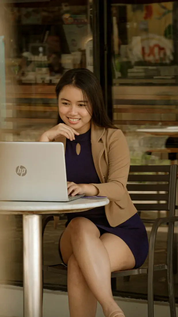 A business owner editing at a café